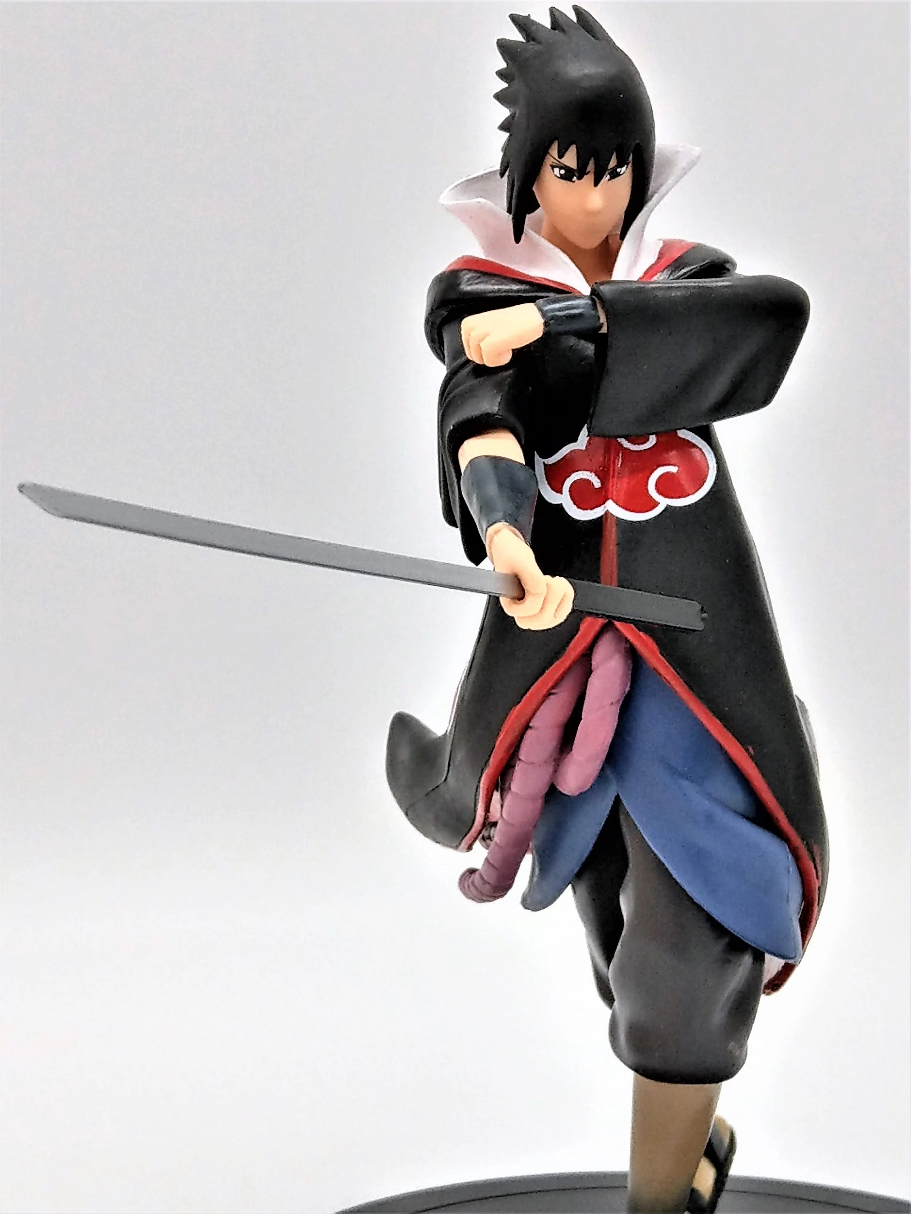 Uchiha Sasuke Collectible Action Figure (Comes with Adhesive Glue!)