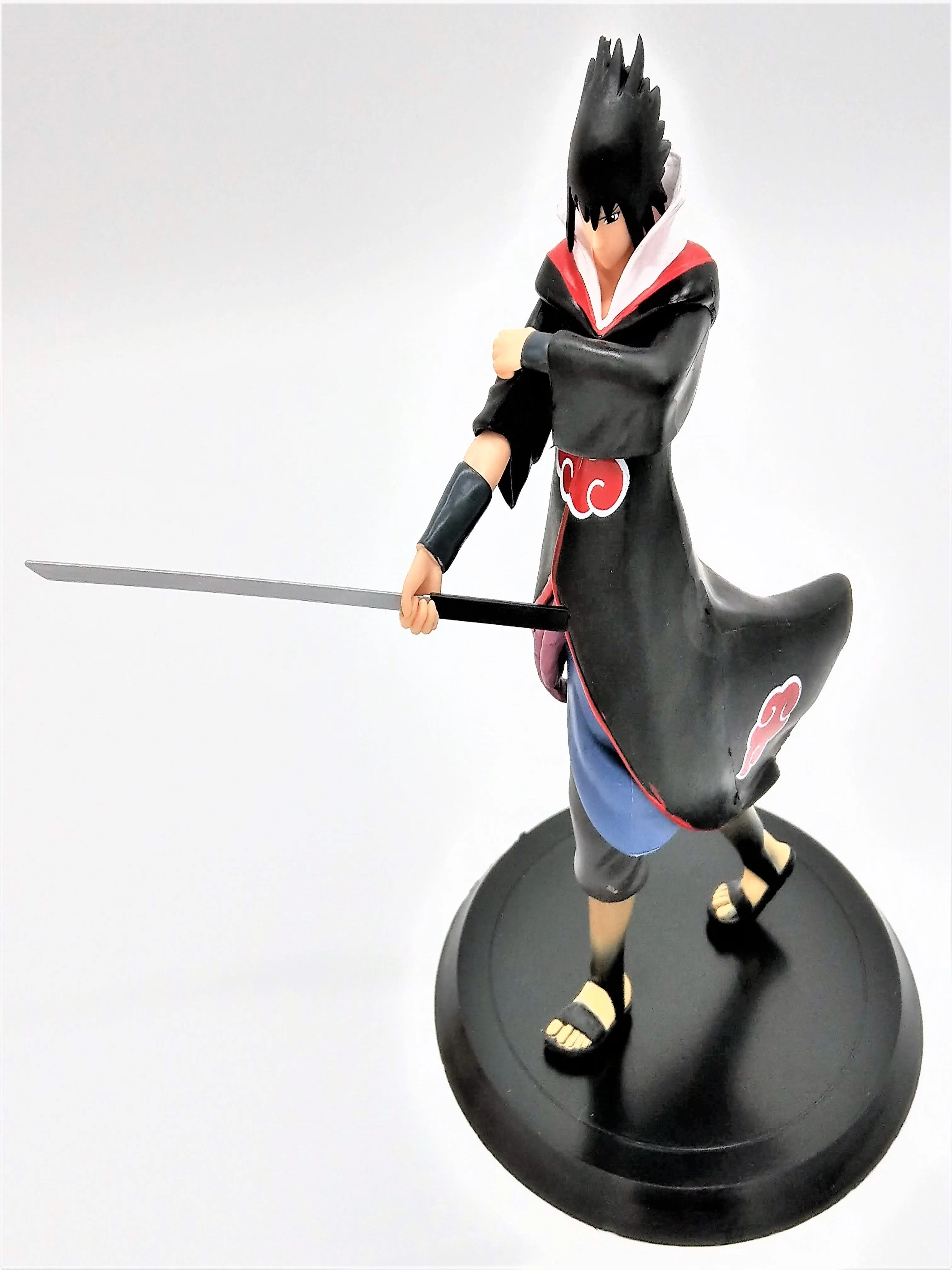 Uchiha Sasuke Collectible Action Figure (Comes with Adhesive Glue!)