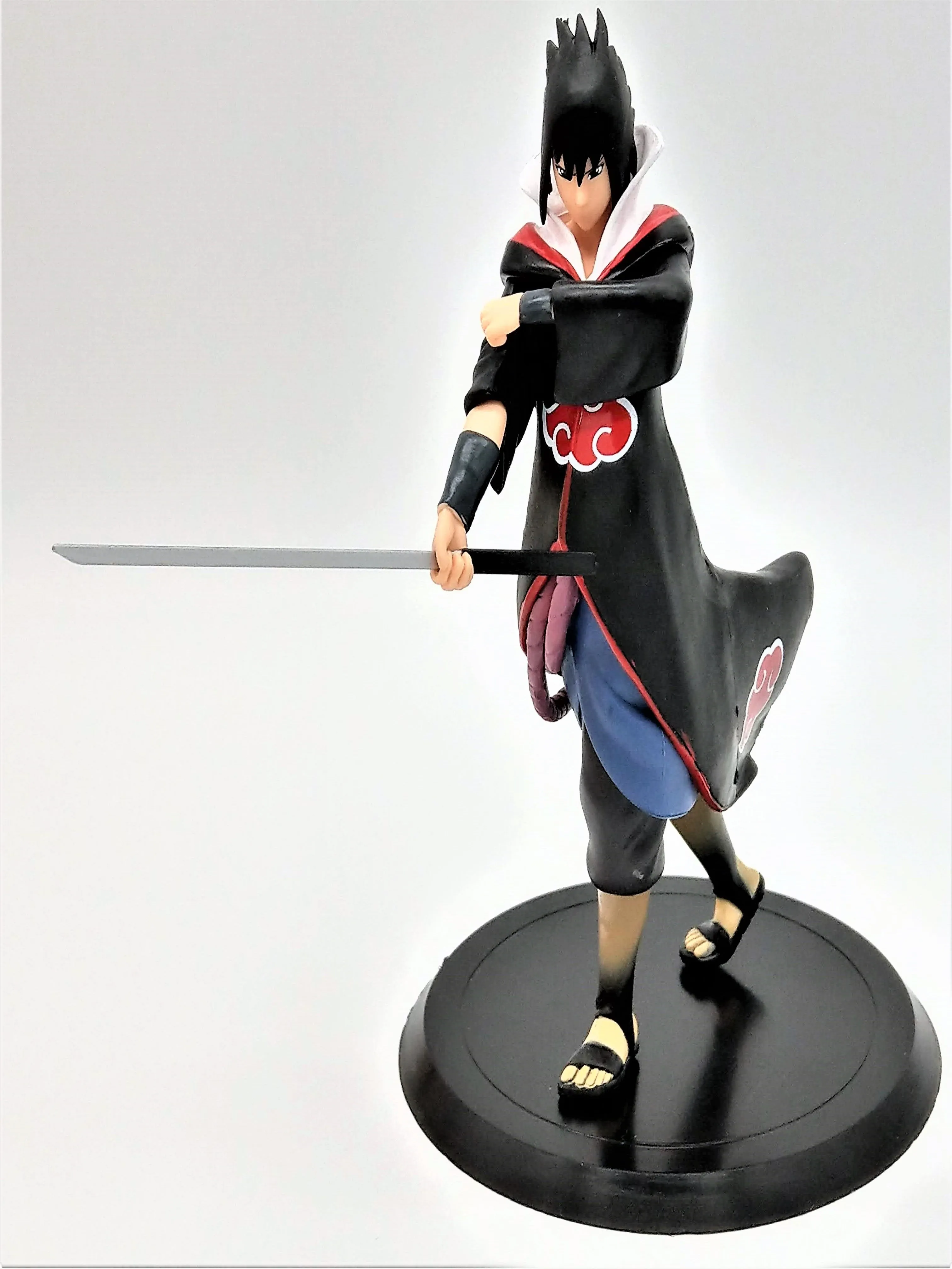 Uchiha Sasuke Collectible Action Figure (Comes with Adhesive Glue!)