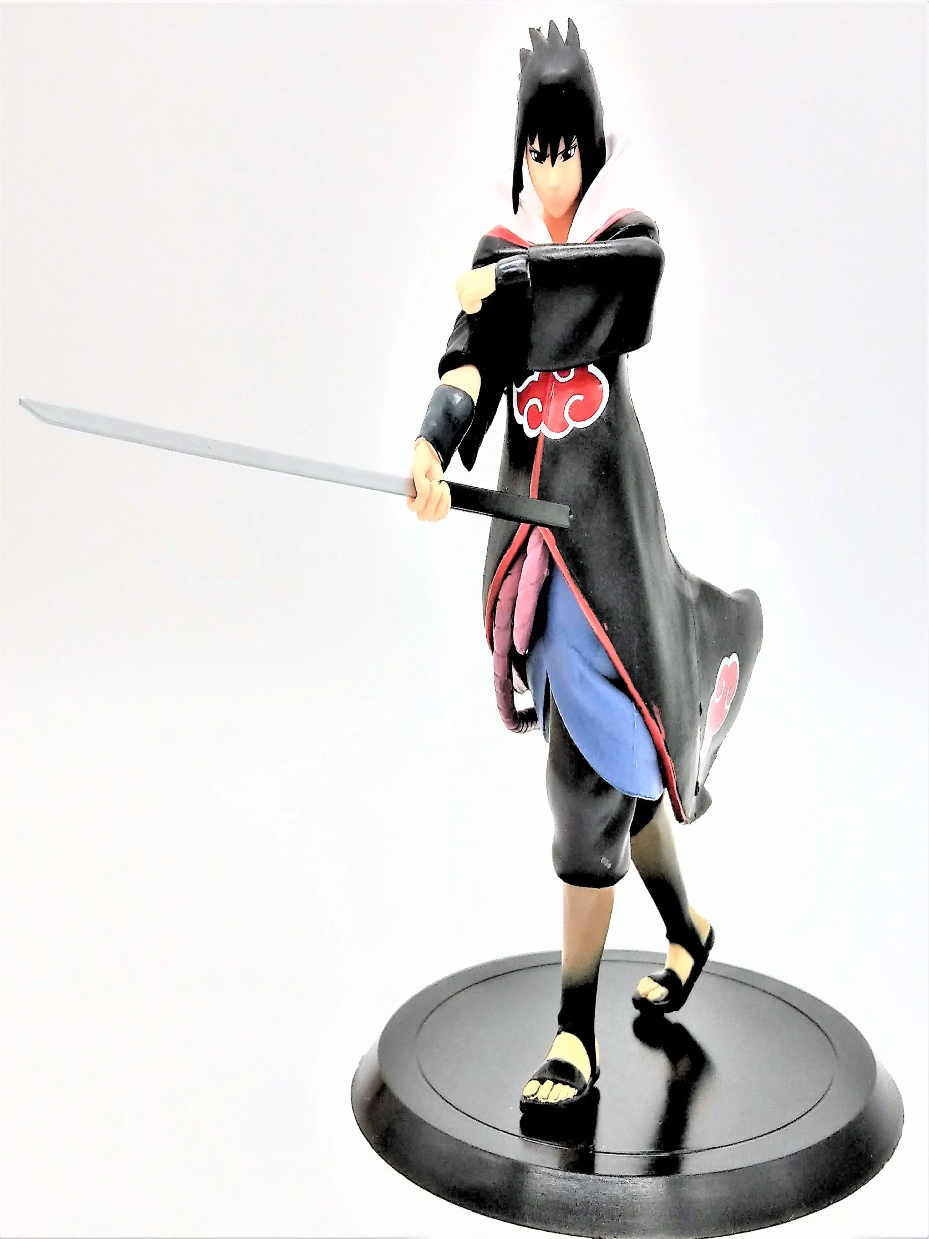 Uchiha Sasuke Collectible Action Figure (Comes with Adhesive Glue!)
